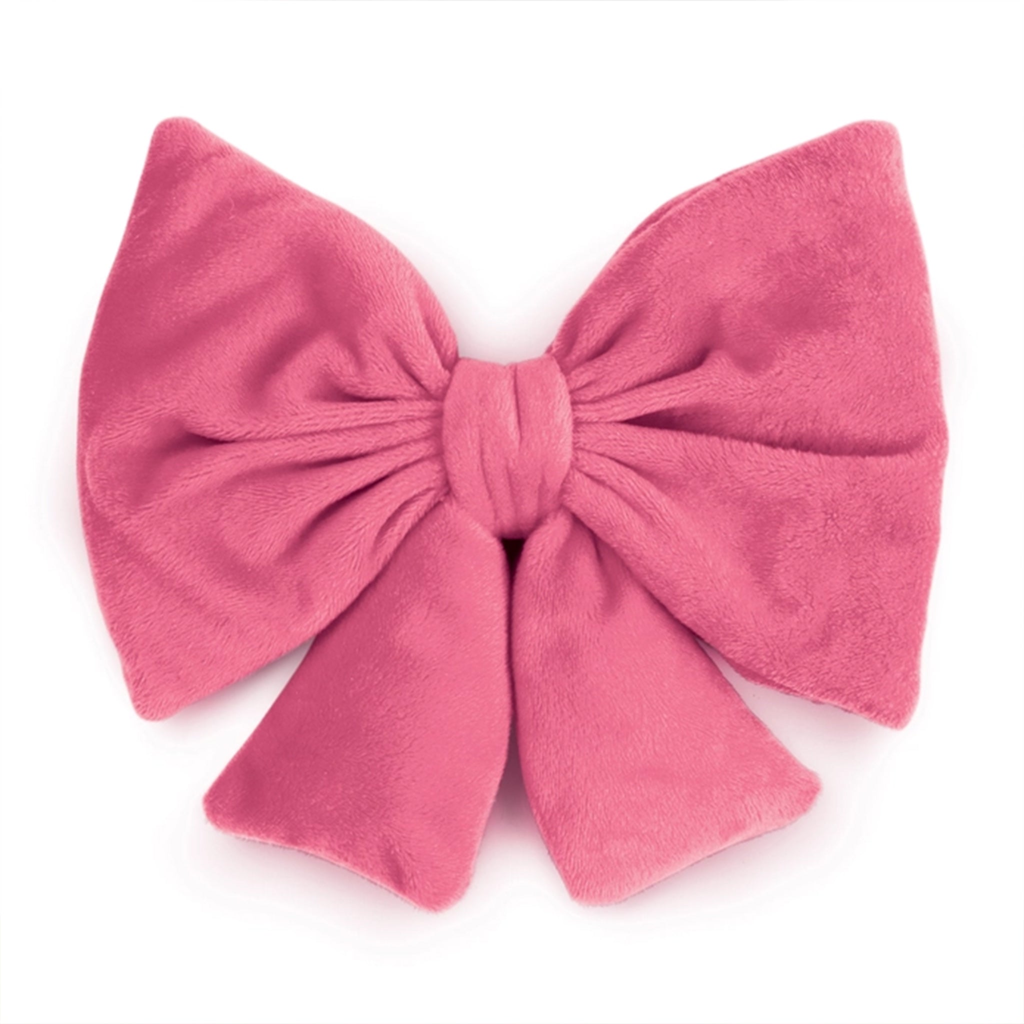 A large plush pink bow with a soft velvety texture, photographed against a clean white background.