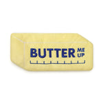 Yellow toy with 'BUTTER ME UP' text on a white background