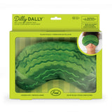 Green plush pickle-shaped comfort pack in packaging with 'Dilly Dally' branding.