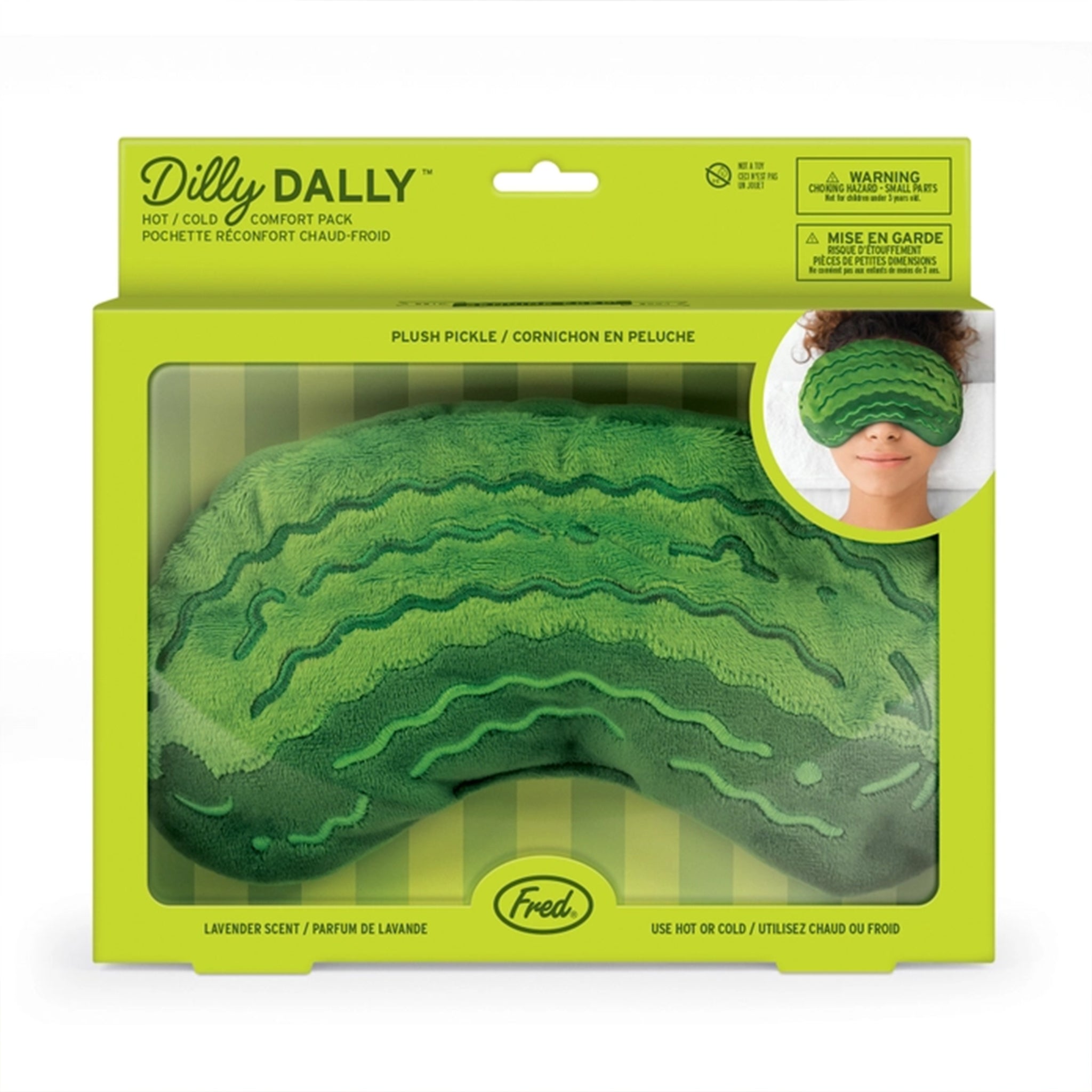 Green plush pickle-shaped comfort pack in packaging with 'Dilly Dally' branding.