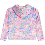 A girls' hooded sweatshirt with a colorful pastel watercolor background and an all-over cosmetic-themed print featuring lip gloss, eyeshadow palettes, makeup brushes, and the words 'FABULOUS' and 'MAKEUP'.
