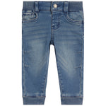 A pair of baby blue denim jeans with a faded wash, ribbed waistband and cuffs, and distressed details on the thighs, shown against a plain white background.