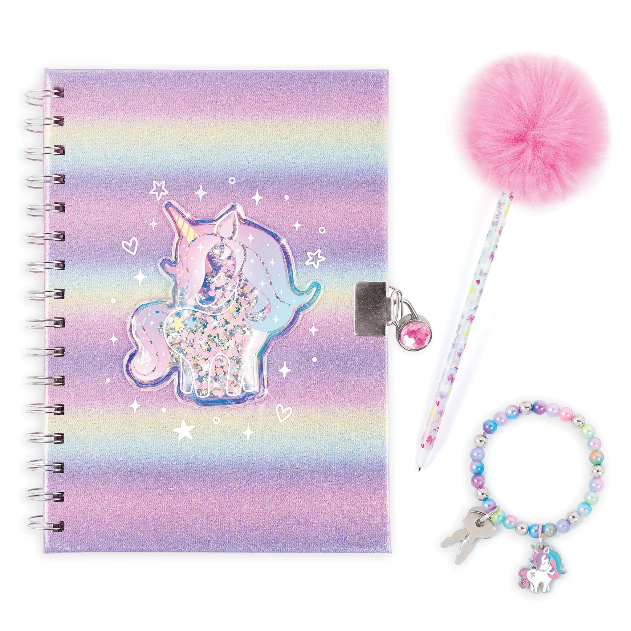 A pastel rainbow spiral notebook with a unicorn illustration, shown with a pink pom-pom pen, a beaded bracelet, and a small keychain on a white background.