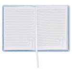 A plush open notebook with lined white pages, a white ribbon bookmark, and light blue bow details on the lower corners of each page, set against a plain white background.