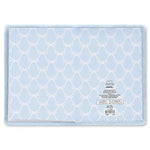 A light blue journey with a white geometric trellis pattern, featuring a soft plush border and a product care label on the right side.