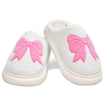 A pair of white fuzzy slip-on slippers with large pink bow designs on the top, shown on a clean white background.