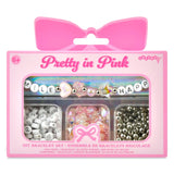 A pink DIY bracelet set in retail packaging with a bow-shaped hanger tab. The package contains three compartments with beads and charms pastel beads, and silver beads.