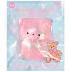 A pink glittery squishy bear squeeze toy inside its light blue and white polka dot retail packaging, featuring the text 'Shimmer Squishy Bear' and a small teddy bear illustration.