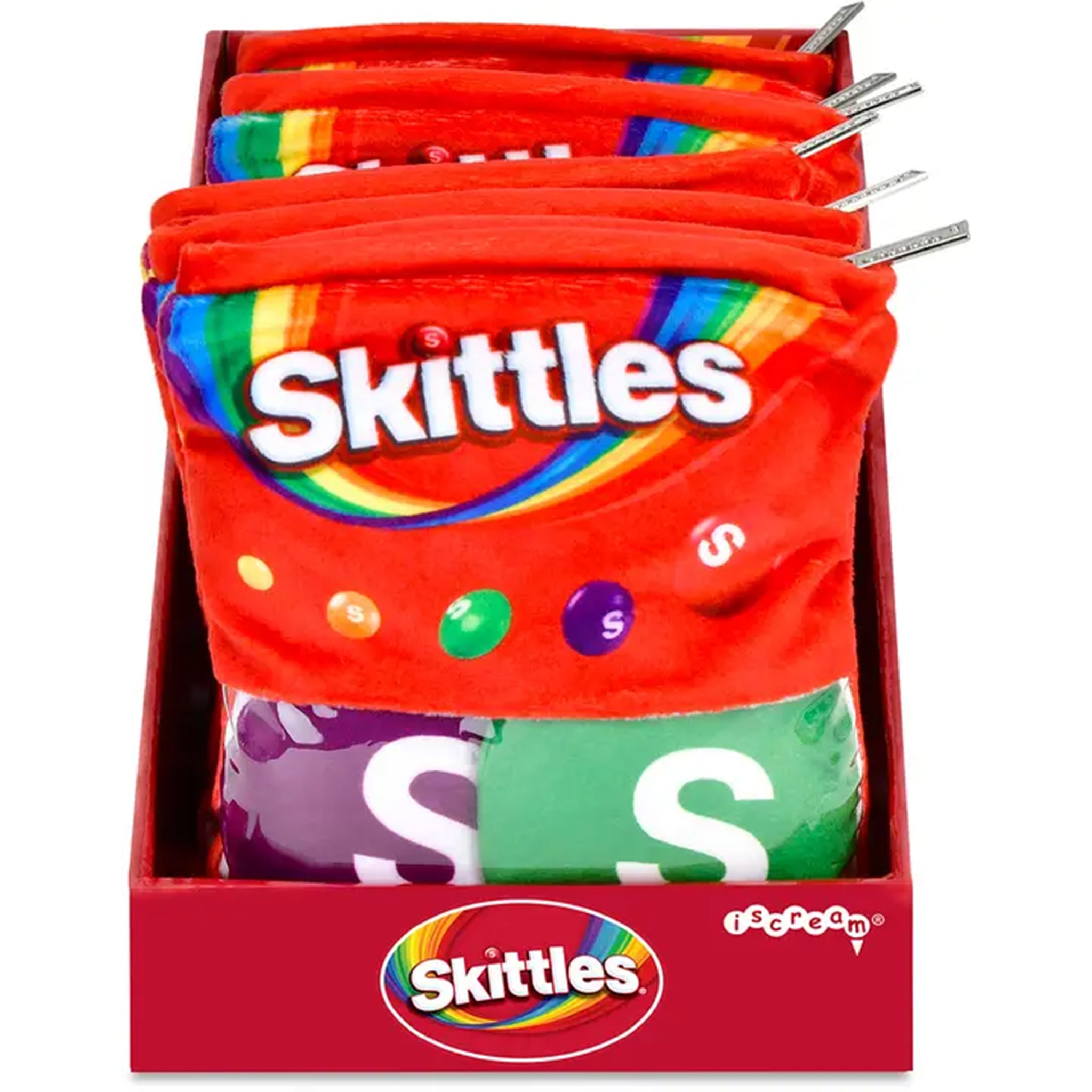 A retail display box filled with red plush pouches designed to look like Skittles candy bags, with visible metal zipper pulls and multiple Skittles branding panels on the front.