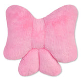 A pink plush bow-shaped cushion with a soft faux fur texture, shown against a plain white background.