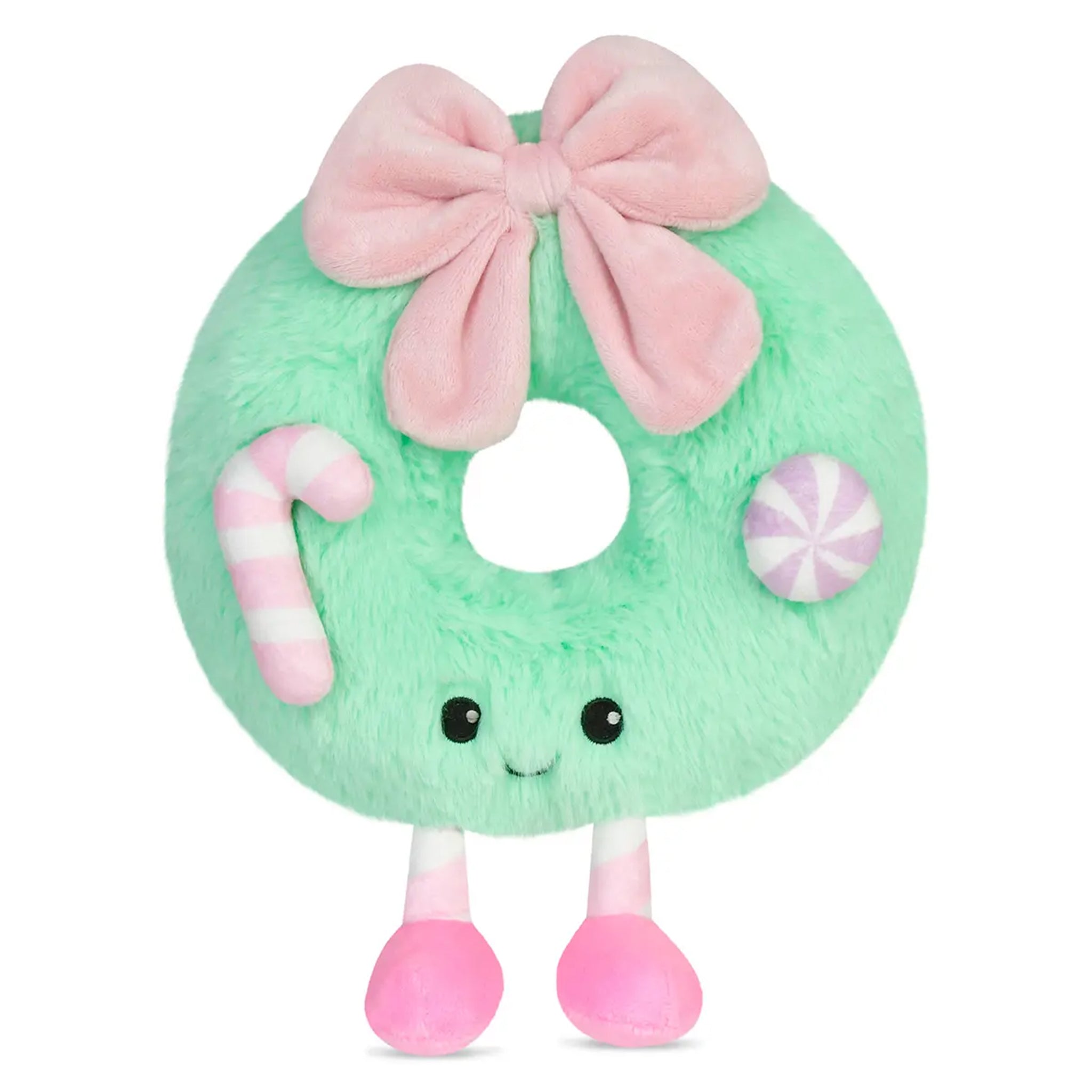 Plush donut toy with a pink bow, candy cane, and peppermint on a white background