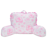 A pink and white floral lounge pillow with ruffled edges and a top carrying handle, shown on a plain white background.