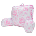 A pink and white floral lounge pillow with ruffled edges and a top carrying handle, shown on a plain white background.