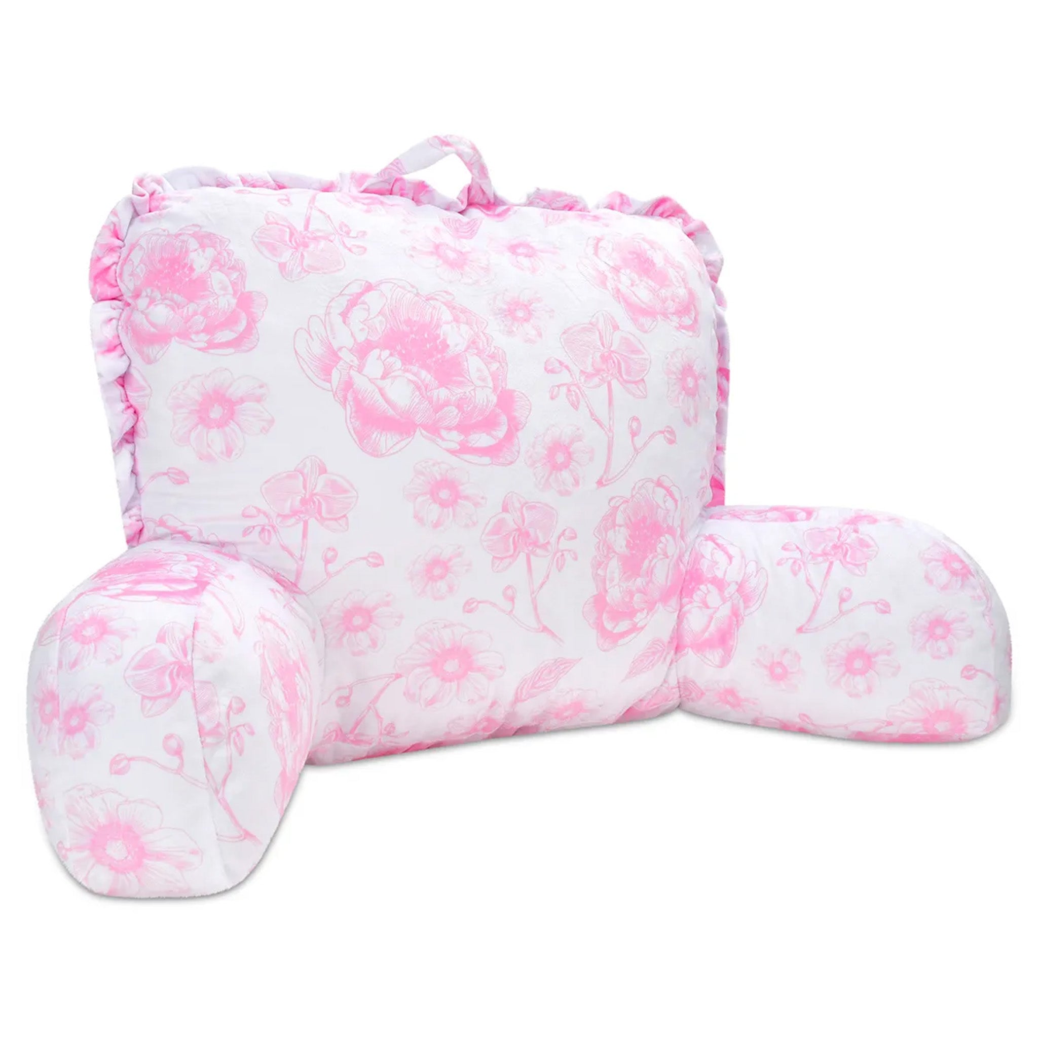 A pink and white floral lounge pillow with ruffled edges and a top carrying handle, shown on a plain white background.