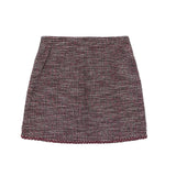 A short A-line skirt in a textured tweed bouclé fabric, featuring a marled pattern of burgundy, brown, and beige threads, finished with a matching ribbed hem.