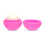 A pink lip balm container shown open with the lid removed, revealing a white balm ball inside one half and an empty pink half in the other, on a white background.
