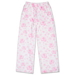 White fleece pajama pants with a pink floral pattern, featuring an elastic waistband and drawstring.