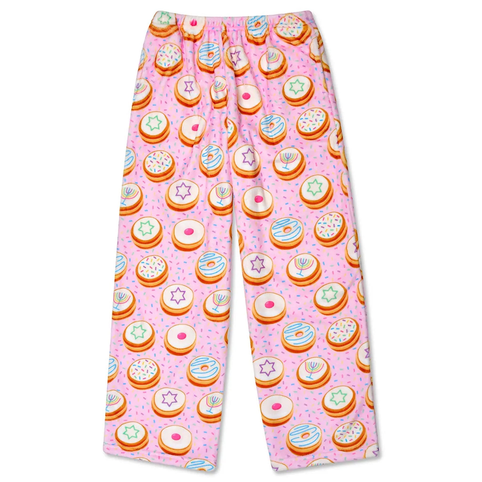 Pink children's pants with an all-over print of colorful donuts, photographed flat against a white background.