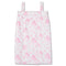 A white spa wrap with a pink floral pattern, featuring thin shoulder straps and a front closure, shown against a plain white background.