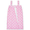 A pink and white patterned spa wrap with shoulder straps and a front tie closure, shown flat against a white background.