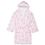 A white hooded bathrobe with a pink floral pattern, featuring a tie belt and front pockets, shown against a plain white background.