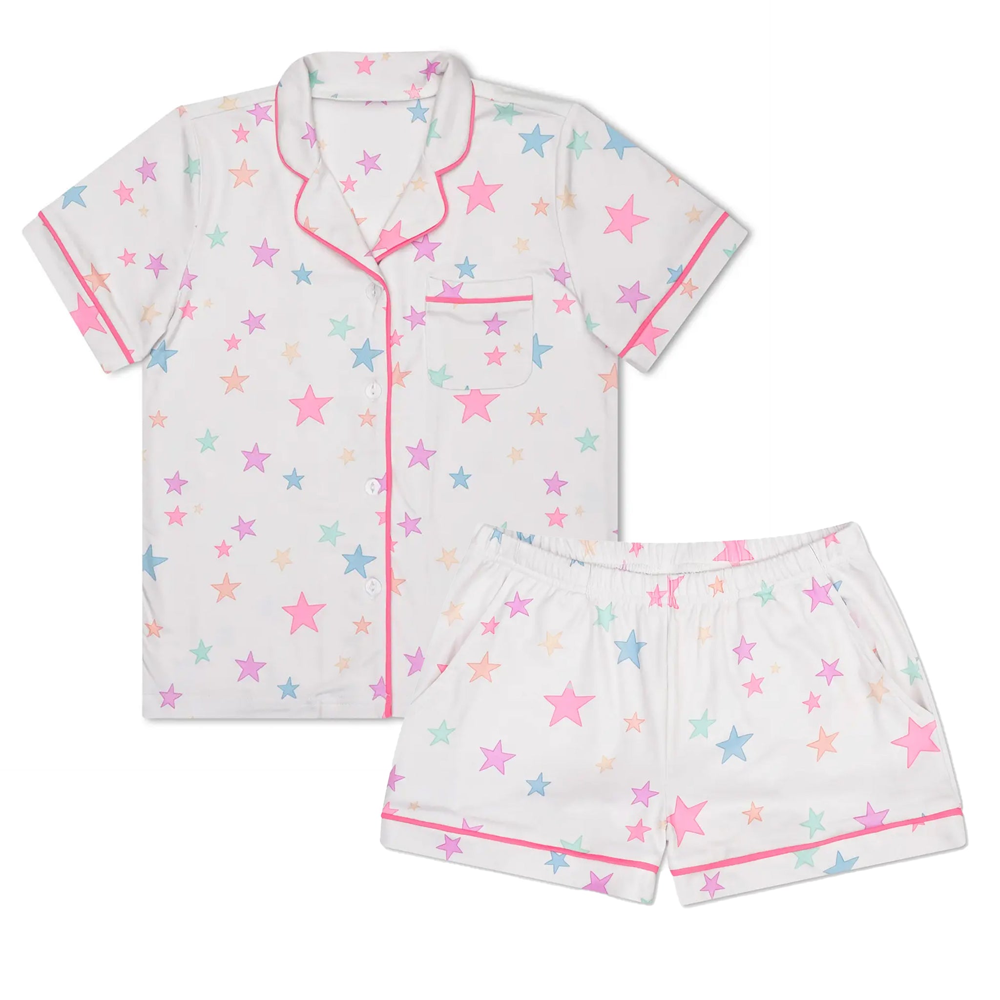 A two-piece children's pajama set featuring a short-sleeve button-front top and matching shorts in white, decorated with a pastel star pattern in pink, blue, and yellow, finished with pink piping trim.