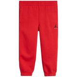 red sweatpants with Jordan air logo