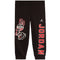 Black sweatpants featuring red and white Air Jordan graphics, including a large 'JORDAN' print down one leg, a '23' and wolf graphic on the other leg, and a white Jumpman logo near the right hip.