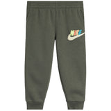 An olive green Nike joggers with  colorful 'NIKE' lettering on the pant, a white swoosh logo