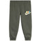 An olive green Nike joggers with  colorful 'NIKE' lettering on the pant, a white swoosh logo