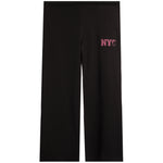Black wide-leg sweatpants featuring a pink embroidered 'NYC' graphic on the upper left thigh, displayed against a solid white background.