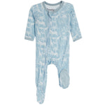 A baby footed sleeper in light blue with a white safari animal and palm tree pattern, featuring a front zipper and long sleeves.