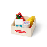 Wooden toy kitchen set with colorful play food items in a box, branded 'Melissa & Doug'.