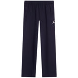 Navy blue athletic pants with an elastic waistband and a small white Jumpman logo on the left hip, shown against a plain white background.