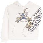 An off-white pullover hoodie featuring a graphic of Michael Jordan mid-air with a basketball, surrounded by championship medallions and text. The right sleeve is printed with 'JORDAN', '6x CHAMPION' in a bold blue and black font.