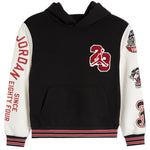 A black and white Jordan hoodie featuring red and white graphics, including the number 23 on the chest, 'JORDAN EIGHTY FOUR' on the sleeve, and a Panther logo on the other sleeve.