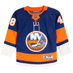 A New York Islanders hockey jersey in navy blue, orange, and white, featuring the team logo on the front, number 48 on the right sleeve, and number 48 on the left sleeve.
