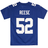 A royal blue football jersey shown from the back, featuring the name 'REESE' and number '52' in bold white block letters. The jersey has short sleeves, a crew neck, and shoulder patches, displayed flat against a solid white background.
