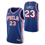 A blue Philadelphia 76ers basketball jersey shown from both front and back. The jersey features the team name 'PHILA' and number '23' on the front, and 'JAMES' and number '23' on the back.