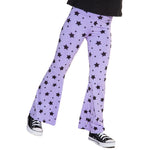 Purple flare pants with a black star pattern, shown on a model from the waist down wearing black sneakers against a white background.