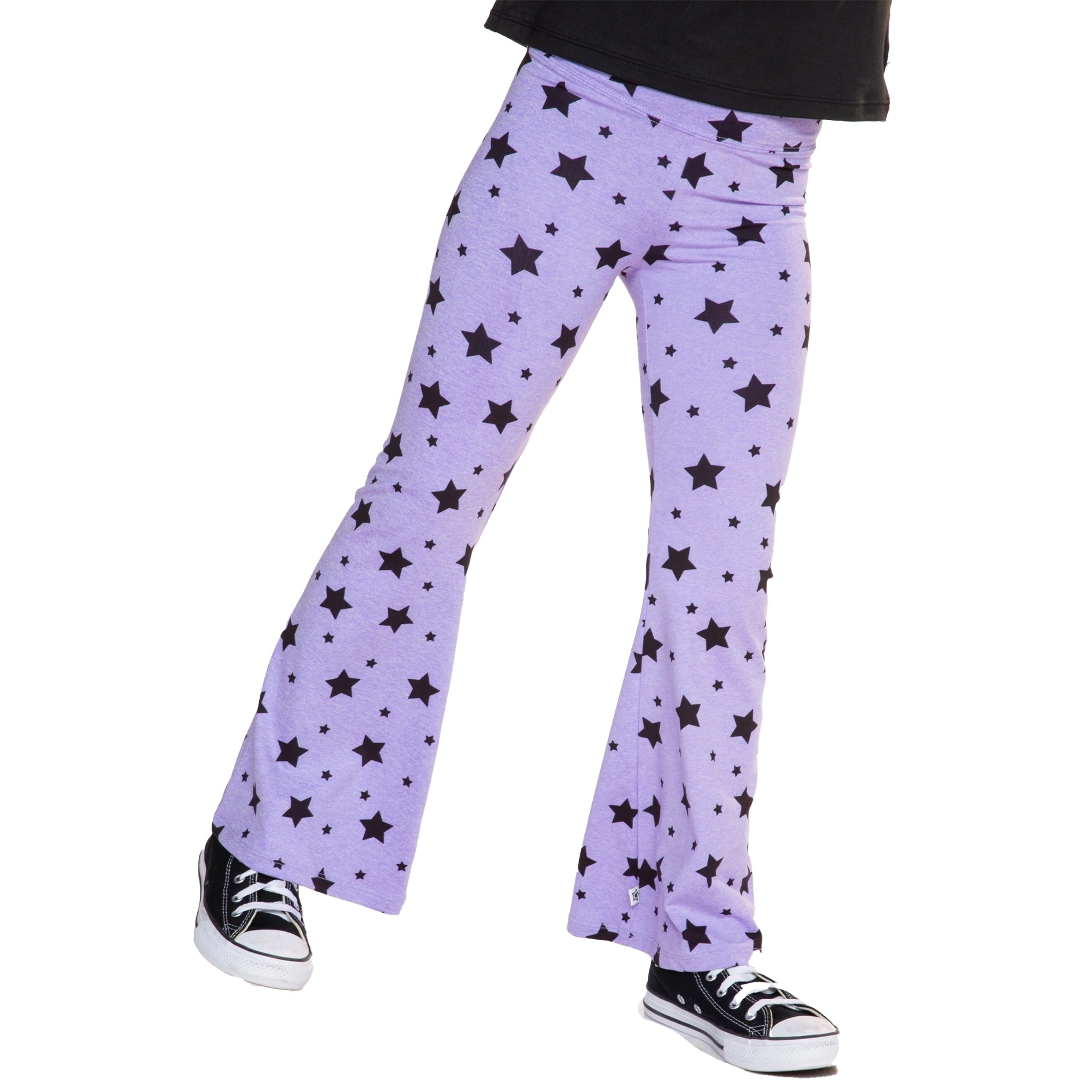 Purple flare pants with a black star pattern, shown on a model from the waist down wearing black sneakers against a white background.