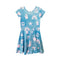 A short-sleeve blue dress with a pink and white cartoon print featuring bunnies, stars, rainbows, and cherries, shown against a plain white background.