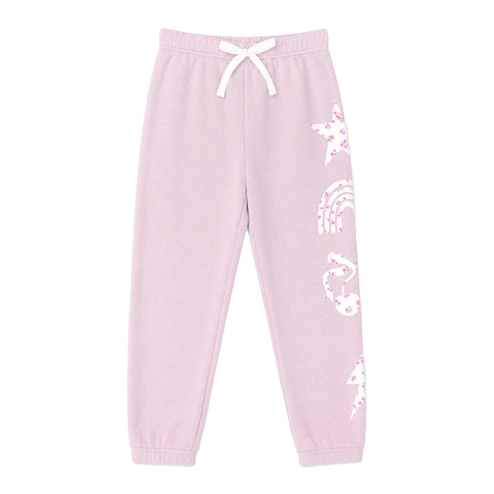 Light pink sweatpants with a white drawstring waist, elastic cuffs, and white printed graphics of stars, rainbows, and sparkles down one leg.