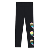 Black leggings with three colorful striped heart graphics on the lower right leg, shown flat against a white background.