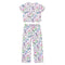A two-piece children's pajama set featuring a short-sleeve top and matching pants, both in a light pink color with a colorful pattern of cherries, bows, stars, and hearts, displayed on a solid white background.