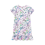 A short-sleeve baby dress with a ruffled hem, featuring a pastel multicolor print of bows, cherries, stars, and hearts on a light lavender background.