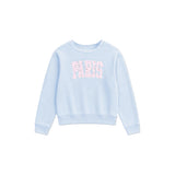 A light blue long-sleeve crewneck sweatshirt featuring the word 'PARIS' printed across the chest in pink floral letters, displayed on a clean white background.