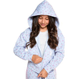 A young girl with long wavy brown hair wearing a light blue hooded zip-up sweatshirt with a pink floral pattern, shown against a solid white background.
