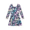 A long-sleeve skater dress with a colorful paint splatter pattern on a dark gray and white background, shown against a plain white background.