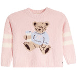 A light pink fuzzy knit sweater with a teddy bear motif on the chest and cream stripes on the sleeves, shown against a plain white background.